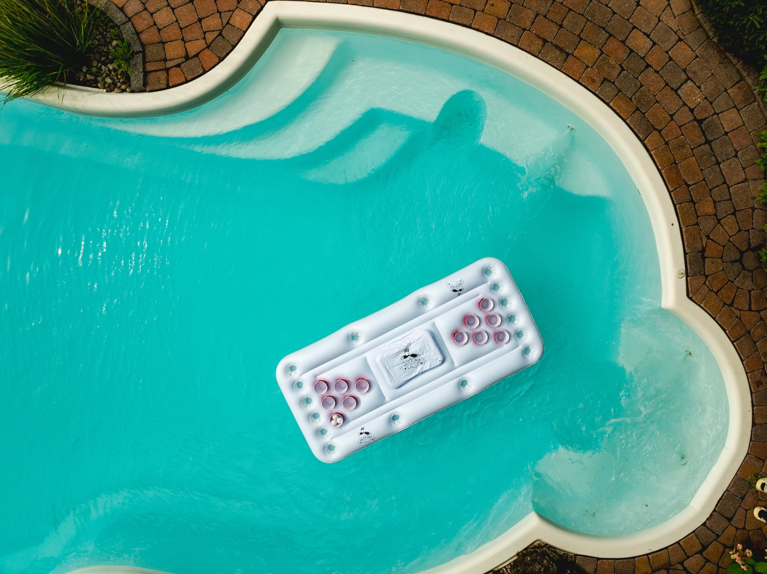 Aerial view of Rack-a-Tack in a pool